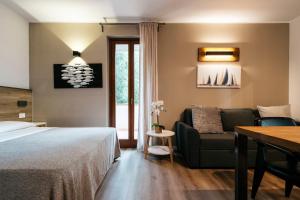 Postel nebo postele na pokoji v ubytování Mistral Apartments