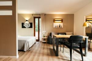 Postel nebo postele na pokoji v ubytování Mistral Apartments