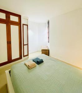 a bedroom with a bed in a room with a window at Sunlight apartment in Costa de Antigua in Costa de Antigua