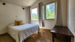 Postel nebo postele na pokoji v ubytování Casa Lavanda