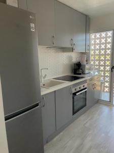 Kuchyň nebo kuchyňský kout v ubytování Apartamento Suzanna