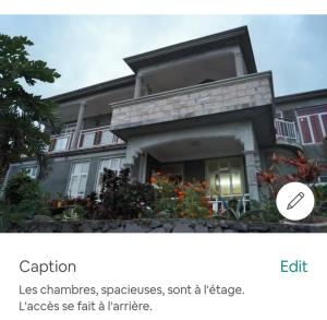 Biana's Home Guest House في بورت ماثورين: لقطه شاشة منزل مع صورة منزل