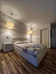 Giường trong phòng chung tại Amazing Park Residences 5 +17 ảnh