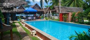 a swimming pool at the resort at Piscine bimoko in Nosy Be