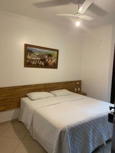 Postel nebo postele na pokoji v ubytování Hotel Casa Branca + 7 fotografií