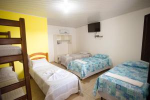 Postel nebo postele na pokoji v ubytování POUSADA DA ILHA