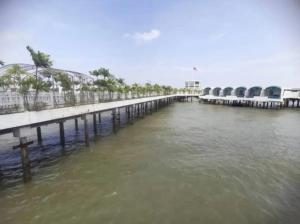 a bridge over a body of water with trees at Port Dickson Leisure Water Villa in Port Dickson