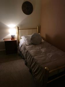 Una cama o camas en una habitación de Departamento Centro Curicó