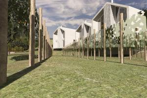 a fence with trees and a white building at Carmo's Boutique Hotel - Small Luxury Hotels of the World in Ponte de Lima