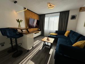 Μια τηλεόραση ή/και κέντρο ψυχαγωγίας στο Apartmán PiccolaDuo v Banskej Bystrici