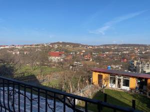 a view of a city from a balcony at Casa Maya in Oradea