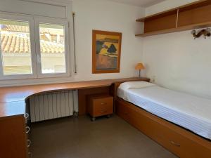 Postel nebo postele na pokoji v ubytování Agi Riu Segre Villa