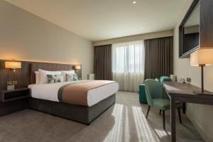 Postel nebo postele na pokoji v ubytování McWilliam Park Hotel + 37 fotografií