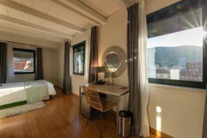 Postel nebo postele na pokoji v ubytování Hotel San Giorgio