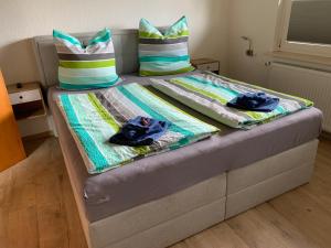 Ένα ή περισσότερα κρεβάτια σε δωμάτιο στο Ferien-Apartments Kunz