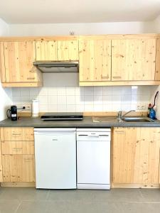 Кухня или мини-кухня в Wohnung 9
