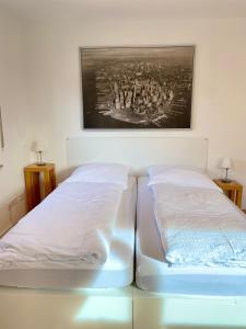 Кровать или кровати в номере Wohnung 9