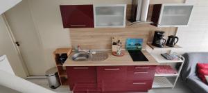 Køkken eller tekøkken på Villa Darom, 7 rue parmentier à Andernos les Bains