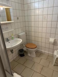 Koupelna v ubytování Pension Raststüb'l + 37 fotografií