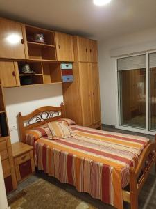 Postel nebo postele na pokoji v ubytování Casa Cádiz