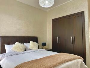 En eller flere senge i et værelse på Appt: Evasion Océanique