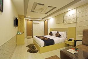 Postel nebo postele na pokoji v ubytování Hotel D'Capitol - Delhi Airport + 37 fotografií