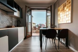 Kuchyň nebo kuchyňský kout v ubytování Mistral Apartments