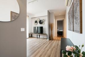TV a/nebo společenská místnost v ubytování Mistral Apartments