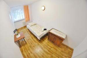 Postel nebo postele na pokoji v ubytování Twój Hostel Bytom