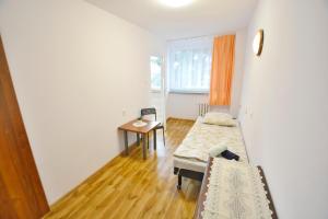 Postel nebo postele na pokoji v ubytování Twój Hostel Bytom