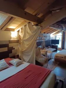 Postel nebo postele na pokoji v ubytování Chalet des secrets