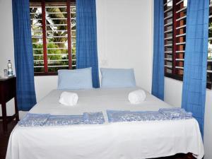 Posteľ alebo postele v izbe v ubytovaní Angeo Beach House