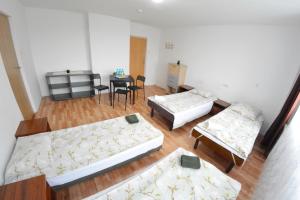 Postel nebo postele na pokoji v ubytování Twój Hostel Bytom