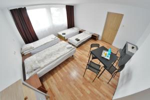 Postel nebo postele na pokoji v ubytování Twój Hostel Bytom