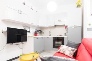 Kuchyň nebo kuchyňský kout v ubytování la casa di gusto + 7 fotografií