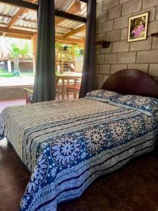 Hermosa Casa de campo y piscina tesisinde bir odada yatak veya yataklar