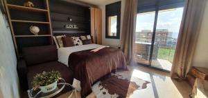 A bed or beds in a room at Apartment Beach Front Canet