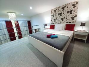 Posteľ alebo postele v izbe v ubytovaní Downtown Acacia str Apartment