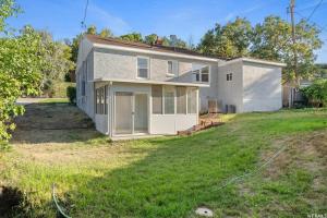 a house with a large yard in front of it at Pet Friendly 5 Bed Home with Waffle Breakfast in Ogden