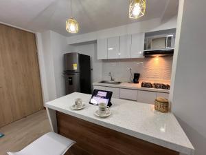 Dapur atau dapur kecil di Moderno comodo y tranquilo apartamento