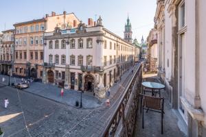 a view of a city street with buildings at Lviv Apartments in Lviv