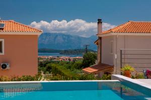 a view from a villa with a swimming pool at Villa Marianna II in Nydri