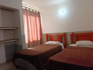 Postel nebo postele na pokoji v ubytování Hotel Palma Real Cartagena
