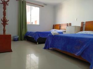 Postel nebo postele na pokoji v ubytování Hotel Palma Real Cartagena