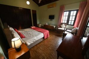 Postel nebo postele na pokoji v ubytování Serene Manor
