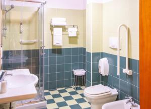 A bathroom at Hotel Riz B.B