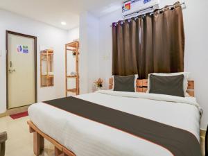 Katil atau katil-katil dalam bilik di Hotel Green Majestic