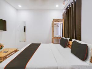 Кровать или кровати в номере Hotel Green Majestic