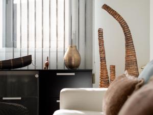 Posedenie v ubytovaní Apartment Abora Garden with terrace, pool, extensive gardens and free parking