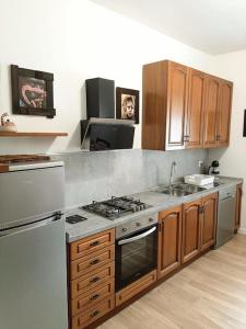 Kuchyň nebo kuchyňský kout v ubytování B&B Vegan La Mucca felice - Grazioso appartamento nel verde